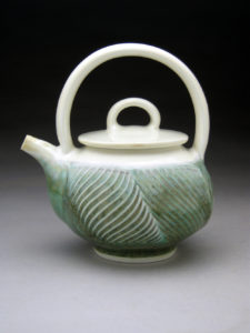 Green Faceted Textured TeaPot - Jeff Brown Faceted with a textural design on the potters wheel. It is then fired to 2340 Degrees - Studio Gallery